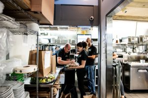 staff preparing to go orders